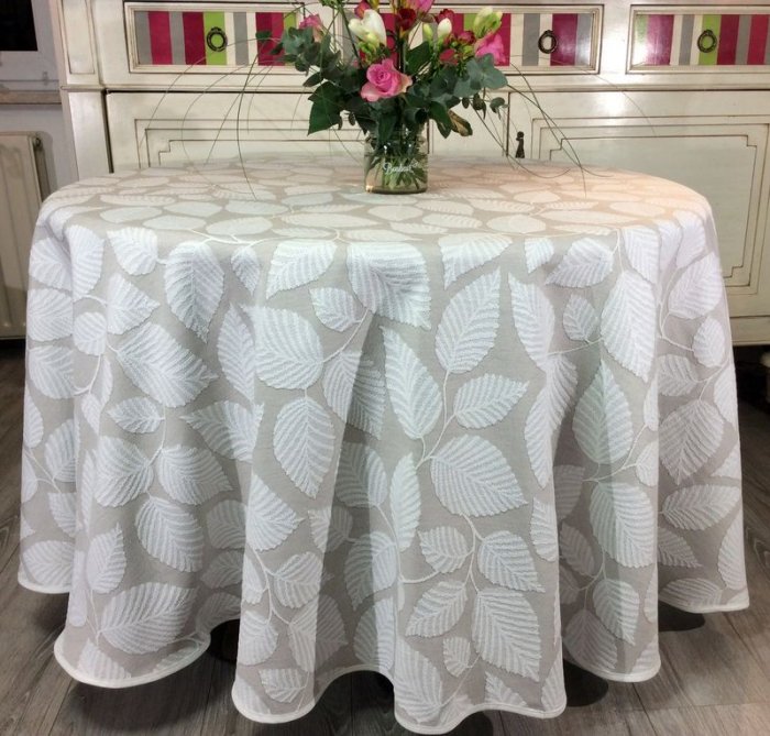 Nappe Sindoa, feuilles allover, fond beige, ronde, polycoton Jacquard 