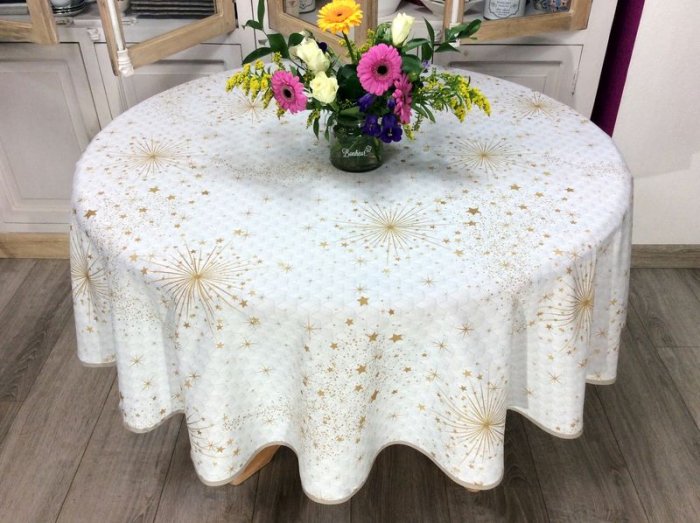 Nappe Illumination, étoiles, feux d'artifices, dorés, fond blanc aux dessins géométriques, ronde Ø180 cm, 100% polyester anti-taches