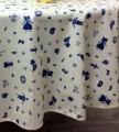 Nappe Colmar rouge ou bleu all over, sur fond blanc cassé, ronde, 100% coton ou coton enduit anti-taches