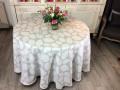 Nappe Sindoa, feuilles allover, fond beige, ronde, polycoton Jacquard 