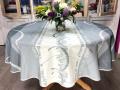 Nappe Astrid, Traits géométriques, sur fond gris-crème, ronde Ø160 cm, 100% polyester anti-taches