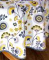 Nappe Inspiration indienne, jaune sur un fond blanc, ronde Ø 180 cm, 100% polyester anti-taches