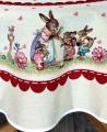 Nappe de Pâques fleurie, famille lapins et oeufs, frise bordeaux, centrée sur fond beige, ronde  Ø 165 cm, polycoton jacquard