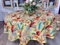 Nappe Feuilles multicolores, sur un fond jaune vénitien, ronde Ø 180 cm, polycoton Jacquard 