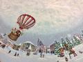 Nappe Père Noël et sa montgolfière, village d'hiver, sapins, sur un fond gris-bleu-beige, ronde Ø 165 cm, polycoton jacquard