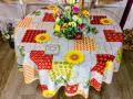 Nappe provençale Chant d'été, tournesols, olives, cigales, géométriques, jaune, rouge, vert, ronde Ø160 cm, 100% polyester anti-taches