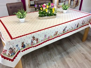 Nappe de Pâques fleurie, famille lapins et oeufs, frise bordeaux, centrée sur fond beige, rectangulaire 140x240 cm, polycoton jacquard